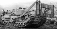 Black and white photo of a tank with some kind of frame strapped to the front