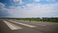 People play, cycle, and relax with BBQs at the end of runway 09R